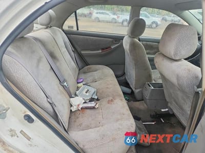 Zdjęcie 10 z 12 samochodu: 2003 TOYOTA COROLLA LE VIN:JTDBR32E230028458 - miniatura