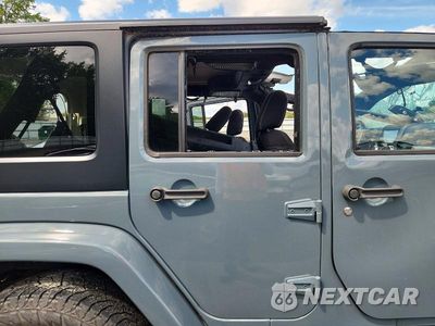 Zdjęcie 10 z 12 samochodu: 2015 JEEP WRANGLER UNLIMITED SAHARA VIN:1C4BJWEG5FL546024 - miniatura