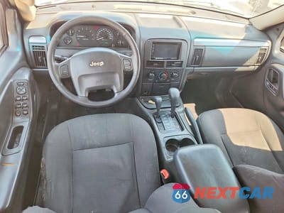 Zdjęcie 8 z 13 samochodu: 2002 JEEP GRAND CHEROKEE LAREDO VIN:1J4GW48N12C183036 - miniatura