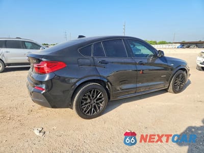Trzecie zdjęcie samochodu z tyłu: 2015 BMW X4 XDRIVE28I VIN:5UXXW3C56F0M87301 - miniatura