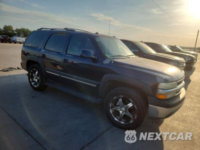 Czwarte zdjęcie samochodu z boku: 2004 CHEVROLET TAHOE C1500 VIN:1GNEC13Z24J333126 - miniatura
