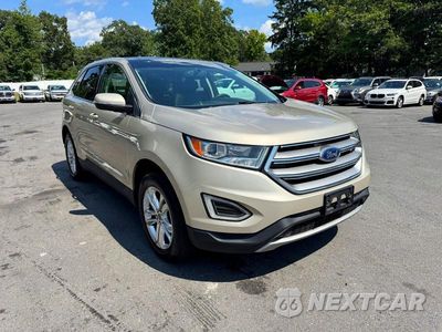 Czwarte zdjęcie samochodu z boku: 2017 FORD EDGE SEL VIN:2FMPK4J91HBC01084 - miniatura