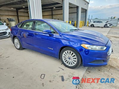 Czwarte zdjęcie samochodu z boku: 2016 FORD FUSION SE HYBRID VIN:3FA6P0LU7GR388235 - miniatura