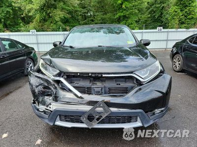 Piąte zdjęcie samochodu w środku: 2017 HONDA CR-V EXL VIN:2HKRW2H81HH655214 - miniatura