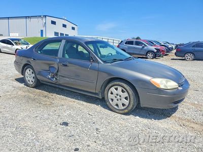Czwarte zdjęcie samochodu z boku: 2002 FORD TAURUS LX VIN:1FAFP52272A214181 - miniatura
