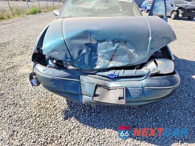 Zdjęcie 11 z 12 samochodu: 1998 CHEVROLET LUMINA BASE VIN:2G1WL52M2W9235747 - miniatura