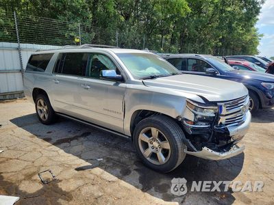 Czwarte zdjęcie samochodu z boku: 2019 CHEVROLET SUBURBAN K1500 PREMIER VIN:1GNSKJKC7KR353583 - miniatura