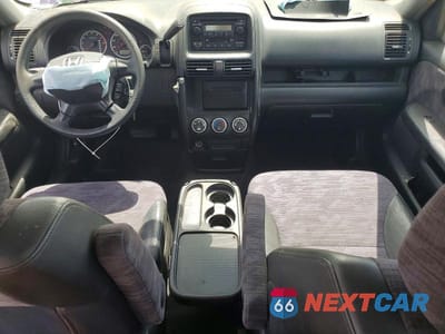 Zdjęcie 8 z 12 samochodu: 2003 HONDA CR-V LX VIN:JHLRD684X3C009915 - miniatura