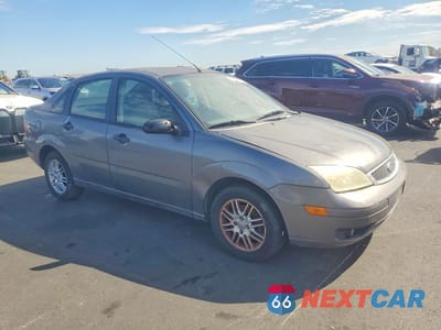 Czwarte zdjęcie samochodu z boku: 2006 FORD FOCUS ZX4 VIN:1FAFP34N46W245022 - miniatura