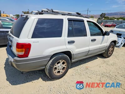 Trzecie zdjęcie samochodu z tyłu: 1999 JEEP GRAND CHEROKEE LAREDO VIN:1J4GW58S9XC682248 - miniatura