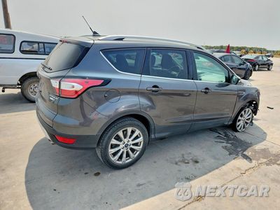 Trzecie zdjęcie samochodu z tyłu: 2018 FORD ESCAPE TITANIUM VIN:1FMCU9J9XJUB58306 - miniatura