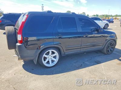 Piąte zdjęcie samochodu w środku: 2004 HONDA CR-V EX VIN:SHSRD78804U211617 - miniatura
