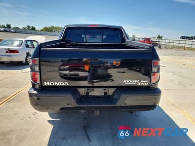Zdjęcie 6 z 12 samochodu: 2014 HONDA RIDGELINE RTL-S VIN:5FPYK1F60EB004418 - miniatura