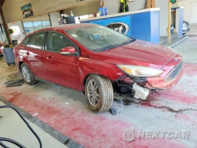 Czwarte zdjęcie samochodu z boku: 2017 FORD FOCUS SE VIN:1FADP3F22HL274291 - miniatura
