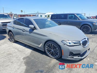 Czwarte zdjęcie samochodu z boku: 2022 BMW 540 I VIN:WBA53BJ02NWX58138 - miniatura