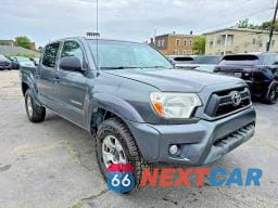 Czwarte zdjęcie samochodu z boku: 2012 TOYOTA TACOMA V6 VIN:5TFLU4EN4CX041871 - miniatura