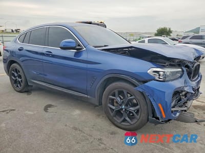 Czwarte zdjęcie samochodu z boku: 2021 BMW X4 XDRIVE30I VIN:5UX2V1C05M9H10428 - miniatura