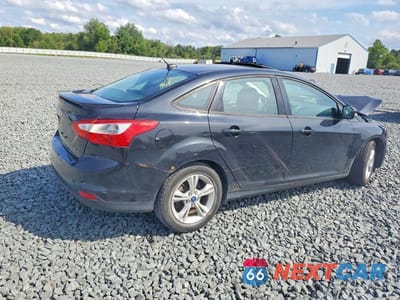 Trzecie zdjęcie samochodu z tyłu: 2012 FORD FOCUS SE VIN:1FAHP3F22CL402135 - miniatura
