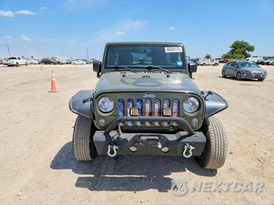 Piąte zdjęcie samochodu w środku: 2015 JEEP WRANGLER UNLIMITED SPORT VIN:1C4BJWDG0FL696804 - miniatura
