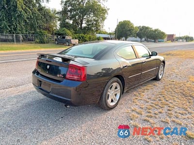 Czwarte zdjęcie samochodu z boku: 2006 DODGE CHARGER R/T VIN:2B3LA53H26H427128 - miniatura