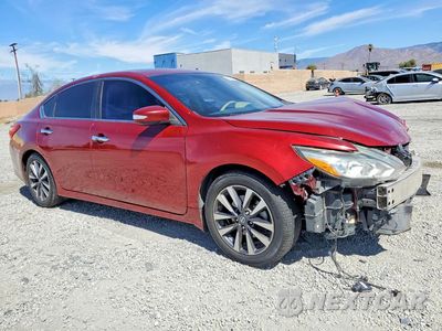 Czwarte zdjęcie samochodu z boku: 2017 NISSAN ALTIMA 2.5 SL VIN:1N4AL3AP1HC297210 - miniatura