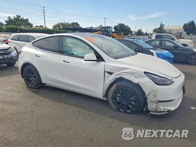 Czwarte zdjęcie samochodu z boku: 2023 TESLA MODEL Y VIN:7SAYGAEE8PF605150 - miniatura
