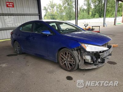 Czwarte zdjęcie samochodu z boku: 2020 HYUNDAI ELANTRA SPORT VIN:KMHD04LB6LU944514 - miniatura