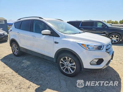 Czwarte zdjęcie samochodu z boku: 2018 FORD ESCAPE SE VIN:1FMCU9GD3JUD60318 - miniatura