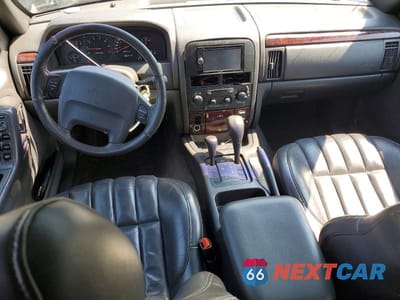 Zdjęcie 8 z 13 samochodu: 2000 JEEP GRAND CHEROKEE LIMITED VIN:1J4GW58N8YC280409 - miniatura