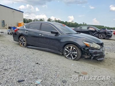 Czwarte zdjęcie samochodu z boku: 2016 NISSAN ALTIMA 2.5 SR VIN:1N4AL3AP3GC180808 - miniatura