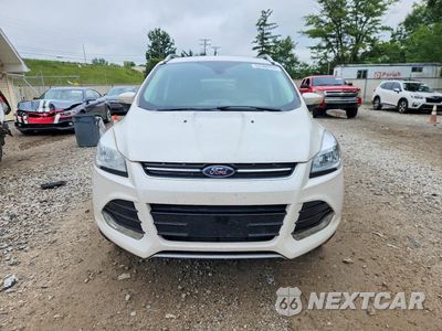 Piąte zdjęcie samochodu w środku: 2016 FORD ESCAPE TITANIUM VIN:1FMCU9J91GUA07587 - miniatura