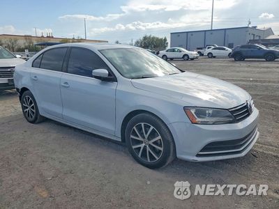 Czwarte zdjęcie samochodu z boku: 2017 VOLKSWAGEN JETTA SE VIN:3VWDB7AJ7HM304220 - miniatura