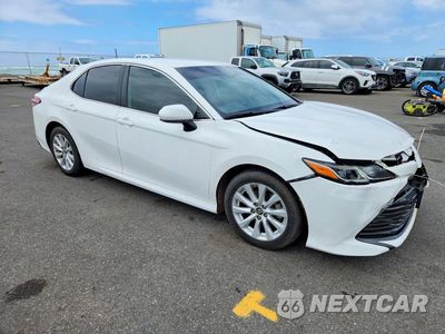 Czwarte zdjęcie samochodu z boku: 2019 TOYOTA CAMRY L VIN:4T1B11HKXKU723329 - miniatura