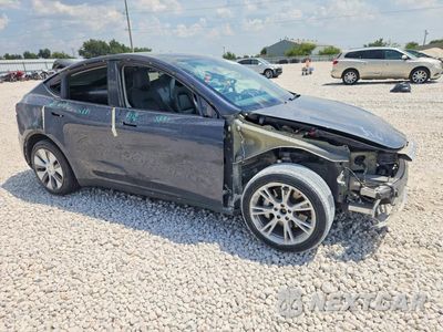 Czwarte zdjęcie samochodu z boku: 2022 TESLA MODEL Y VIN:7SAYGDEE6NA004606 - miniatura