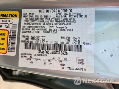 Zdjęcie 12 z 12 samochodu: 2013 FORD FUSION TITANIUM PHEV VIN:3FA6P0SU6DR373626 - miniatura