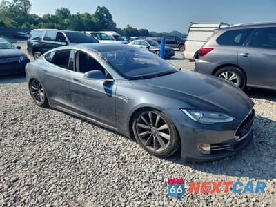 Czwarte zdjęcie samochodu z boku: 2012 TESLA MODEL S VIN:5YJSA1CP8CFP01797 - miniatura