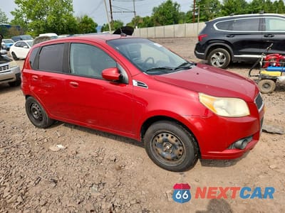 Czwarte zdjęcie samochodu z boku: 2011 CHEVROLET AVEO LS VIN:KL1TD6DE7BB136263 - miniatura
