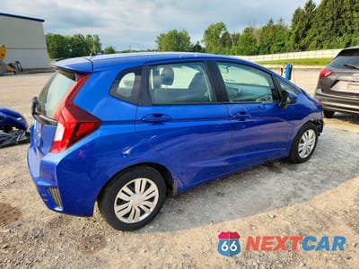Trzecie zdjęcie samochodu z tyłu: 2015 HONDA FIT LX VIN:3HGGK5H52FM786073 - miniatura