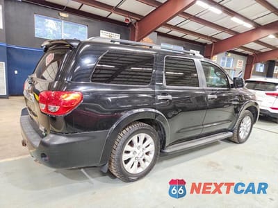 Trzecie zdjęcie samochodu z tyłu: 2012 TOYOTA SEQUOIA PLATINUM VIN:5TDDW5G12CS059404 - miniatura