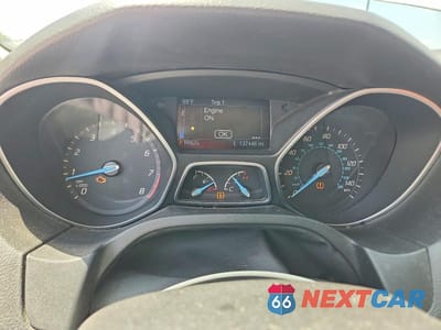 Zdjęcie 9 z 12 samochodu: 2014 FORD FOCUS TITANIUM VIN:1FADP3J21EL240653 - miniatura