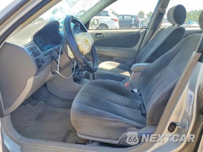 Zdjęcie 7 z 12 samochodu: 2001 TOYOTA COROLLA LE VIN:2T1BR12E61C391546 - miniatura