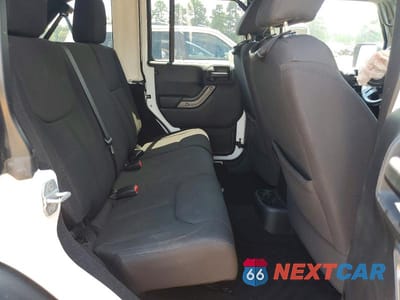 Zdjęcie 10 z 12 samochodu: 2013 JEEP WRANGLER UNLIMITED SPORT VIN:1C4BJWDG5DL502121 - miniatura