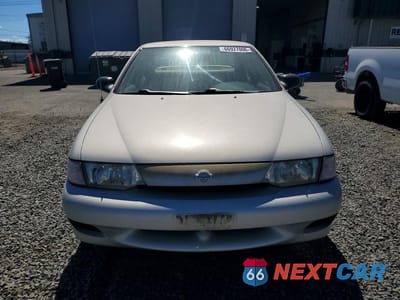 Piąte zdjęcie samochodu w środku: 1999 NISSAN SENTRA XE VIN:1N4AB41D4XC729673 - miniatura