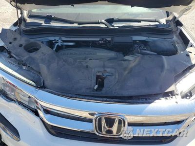 Zdjęcie 12 z 13 samochodu: 2019 HONDA PILOT TOURING VIN:5FNYF6H90KB052854 - miniatura