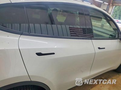 Zdjęcie 10 z 12 samochodu: 2023 TESLA MODEL Y VIN:7SAYGDEE7PF763657 - miniatura