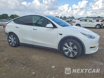 Czwarte zdjęcie samochodu z boku: 2021 TESLA MODEL Y VIN:5YJYGDEE7MF131539 - miniatura