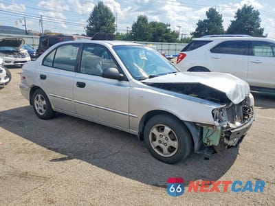 Czwarte zdjęcie samochodu z boku: 2002 HYUNDAI ACCENT GL VIN:KMHCG45C82U387634 - miniatura