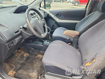 Zdjęcie 7 z 12 samochodu: 2009 TOYOTA YARIS BASE VIN:JTDJT903495240310 - miniatura