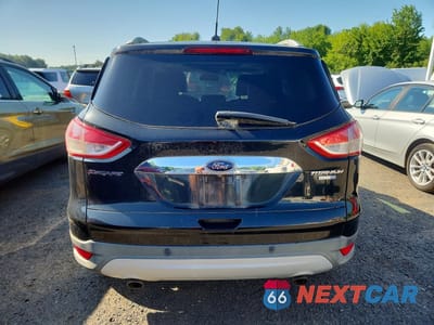 Zdjęcie 6 z 14 samochodu: 2014 FORD ESCAPE VIN:1FMCU9JX4EUC41301 - miniatura