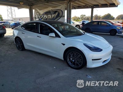 Czwarte zdjęcie samochodu z boku: 2023 TESLA MODEL 3 VIN:5YJ3E1EA7PF505972 - miniatura